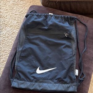 Nike Black Drawstring Backpack with White Swoosh Logo